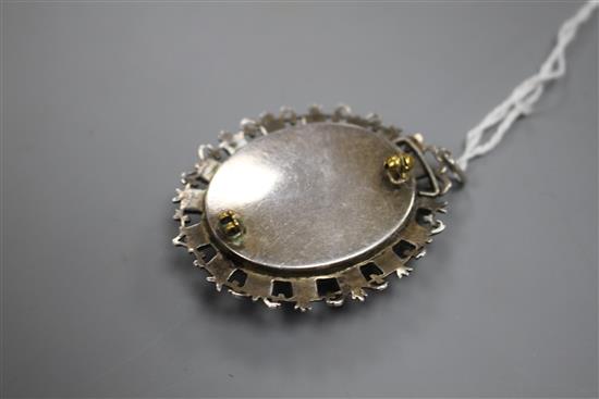 A continental white metal and gem set pendant locket brooch, 50mm, gross weight 31.5 grams.